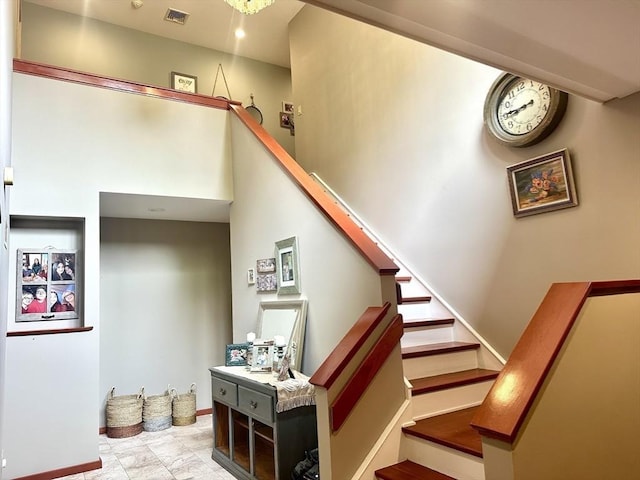 201 Main Rd, Williamsburg, MA 01039 - staircase with baseboards and a towering ceiling