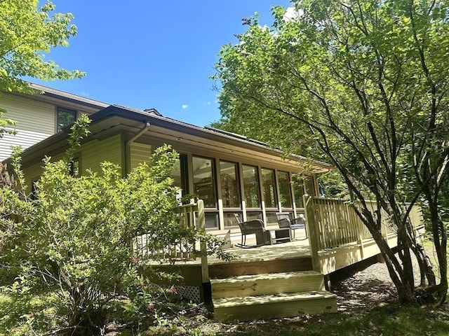 201 Main Rd, Williamsburg, MA 01039 - wooden terrace with a sunroom