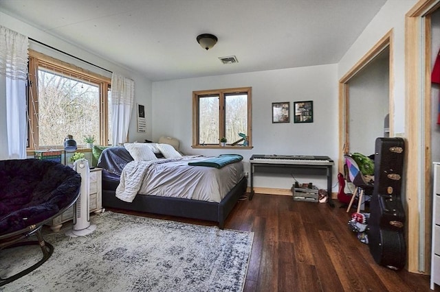 201 Main Rd, Williamsburg, MA 01039 - bedroom with multiple windows and wood finished floors