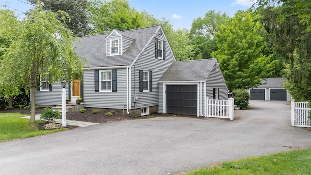 9 Oak St, Wayland, MA 01778 - cape cod home featuring roof with shingles and a gate