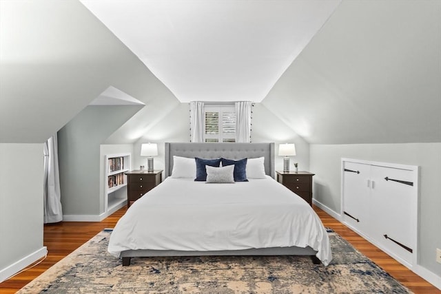 9 Oak St, Wayland, MA 01778 - bedroom with wood finished floors, baseboards, and vaulted ceiling