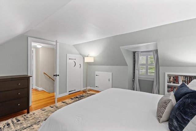 9 Oak St, Wayland, MA 01778 - bedroom with wood finished floors, lofted ceiling, and baseboards