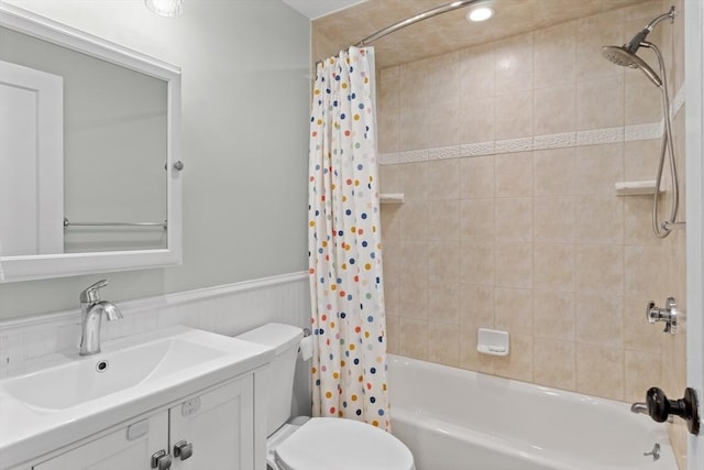 9 Oak St, Wayland, MA 01778 - bathroom with shower / bath combo, vanity, toilet, and a wainscoted wall