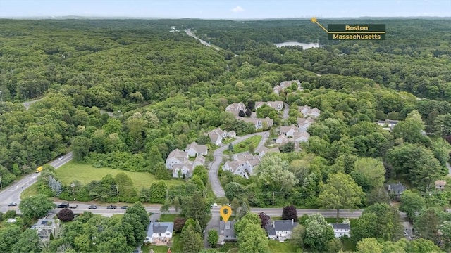 9 Oak St, Wayland, MA 01778 - aerial view of property and surrounding area featuring a heavily wooded area