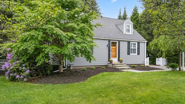 9 Oak St, Wayland, MA 01778 - view of front facade with a front yard and roof with shingles