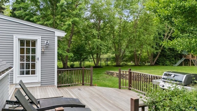 9 Oak St, Wayland, MA 01778 - wooden terrace featuring a playground, grilling area, and view of scattered trees