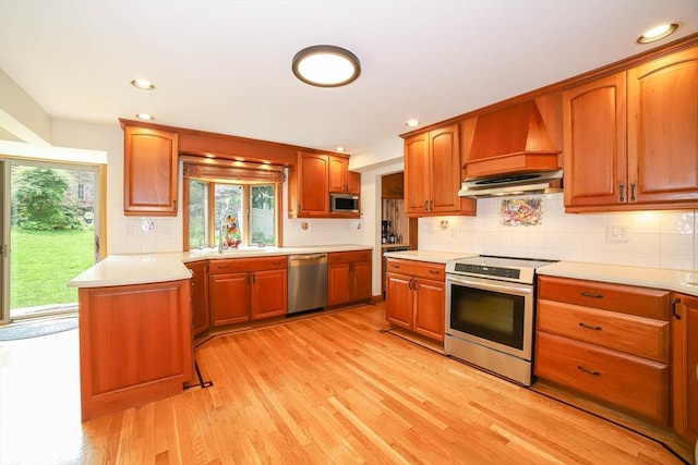 493 Salisbury St, Worcester, MA 01609 - kitchen with stainless steel appliances, plenty of natural light, light countertops, and recessed lighting