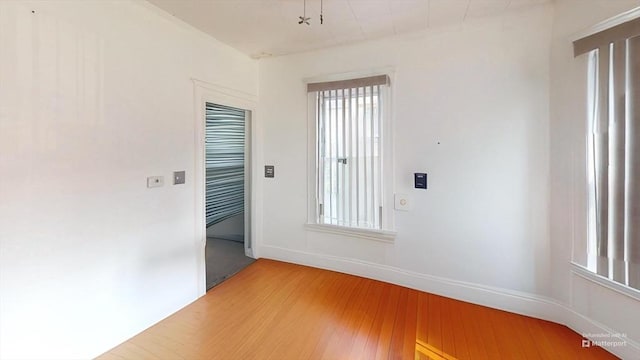 1-3 River Pl, Methuen, MA 01844 - empty room featuring light wood-style flooring and baseboards