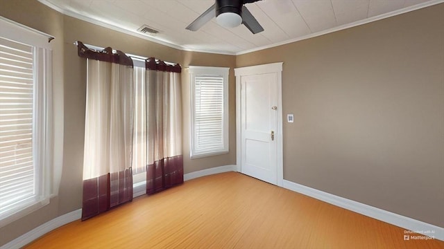 1-3 River Pl, Methuen, MA 01844 - empty room with ceiling fan, baseboards, crown molding, and light wood-style floors