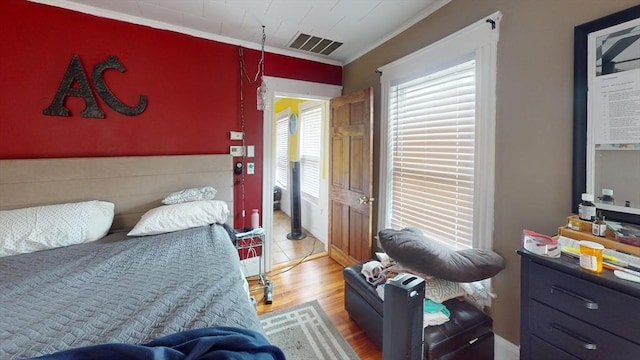 1-3 River Pl, Methuen, MA 01844 - bedroom featuring ornamental molding and wood finished floors