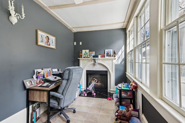 office space with a fireplace