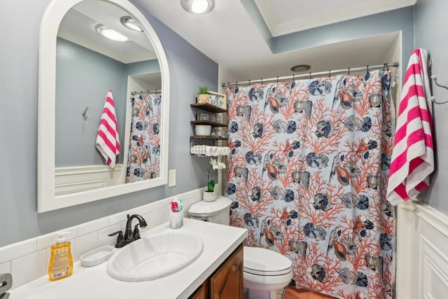 full bath with toilet, ornamental molding, vanity, and a shower with shower curtain