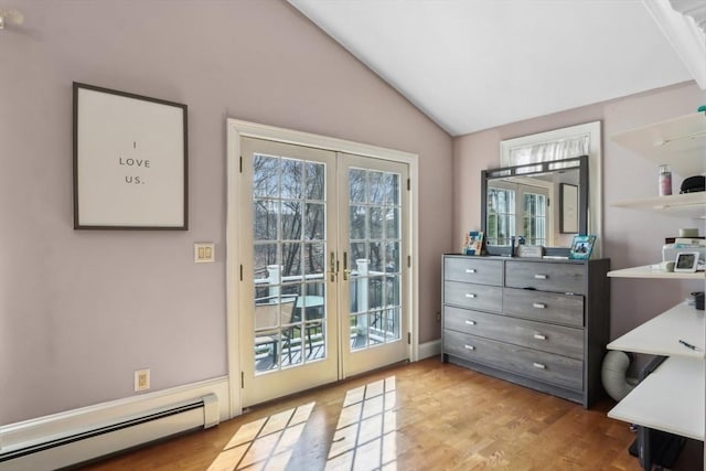 doorway featuring a baseboard heating unit, french doors, wood finished floors, and vaulted ceiling
