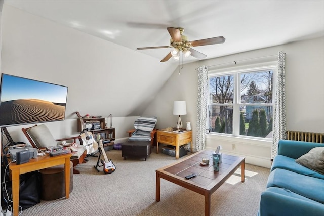 living room featuring lofted ceiling, radiator heating unit, carpet flooring, and ceiling fan