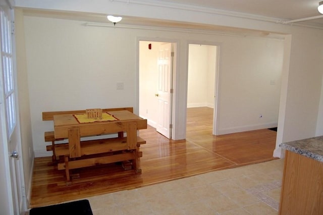 dining area with light wood finished floors