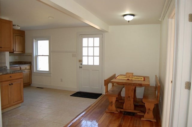doorway with baseboards