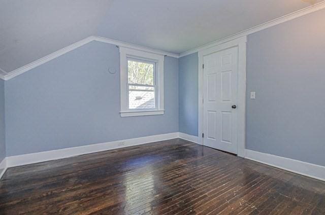 17 Harrison St, New Bedford, MA 02740 - bonus room featuring wood-type flooring, baseboards, and vaulted ceiling