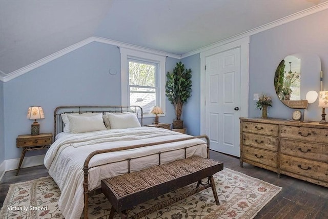 17 Harrison St, New Bedford, MA 02740 - bedroom with dark wood finished floors, lofted ceiling, and baseboards