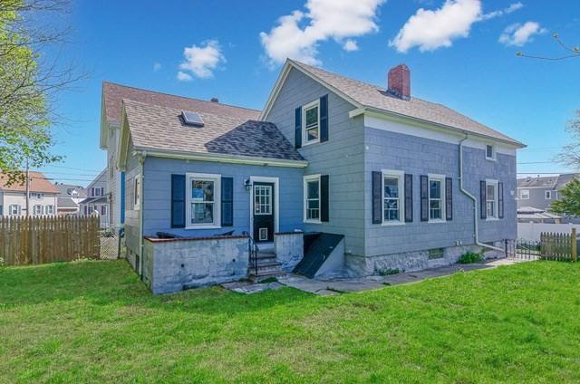 17 Harrison St, New Bedford, MA 02740 - rear view of house featuring a chimney, entry steps, and a shingled roof