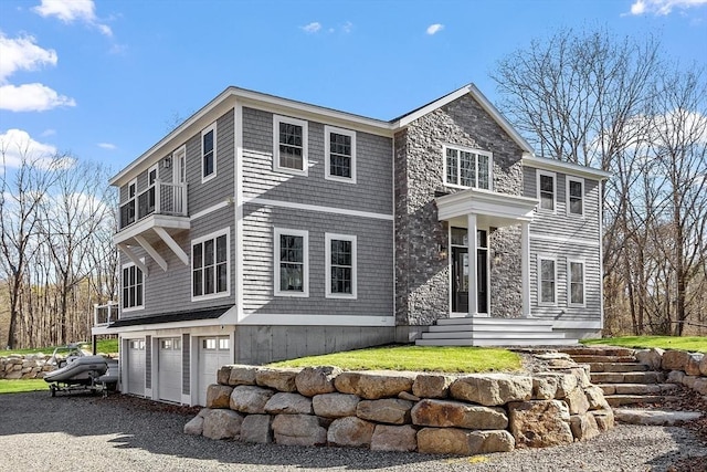 3 Toronto Ave, Gloucester, MA 01930 - shingle-style home with a garage, stone siding, driveway, and a balcony