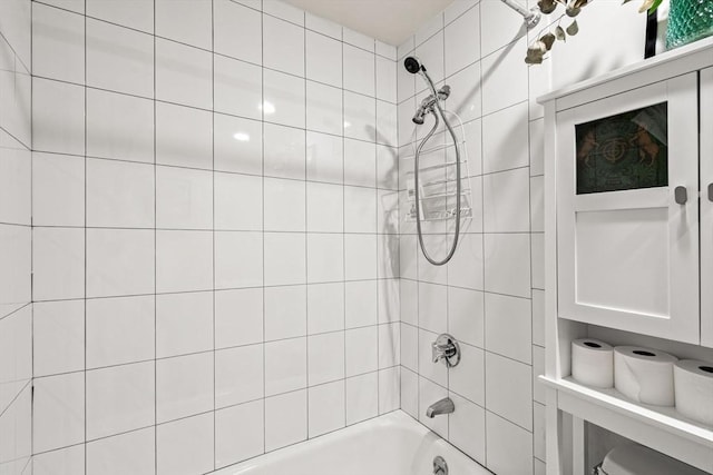 bathroom featuring  shower combination