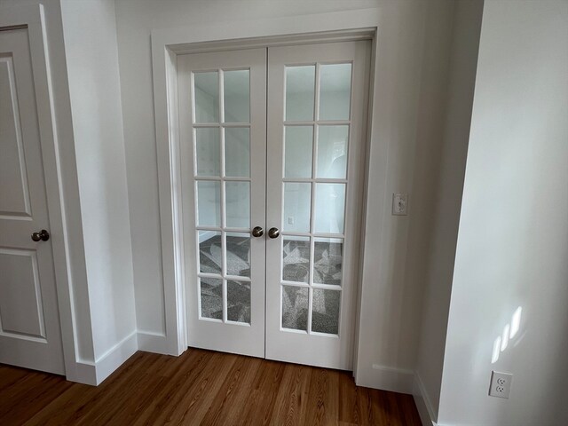 doorway to outside with hardwood / wood-style floors and french doors