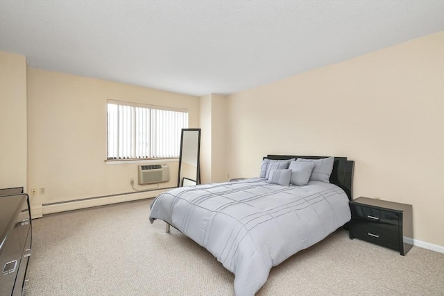 131 Coolidge Ave Unit 422, Watertown, MA 02472 - bedroom featuring an AC wall unit, baseboards, a baseboard heating unit, and light carpet