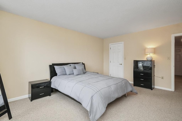 131 Coolidge Ave Unit 422, Watertown, MA 02472 - bedroom featuring carpet floors and baseboards