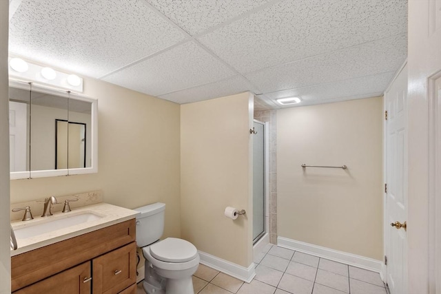 16 Elm St, Leominster, MA 01453 - full bath with tile patterned floors, toilet, a shower stall, vanity, and baseboards