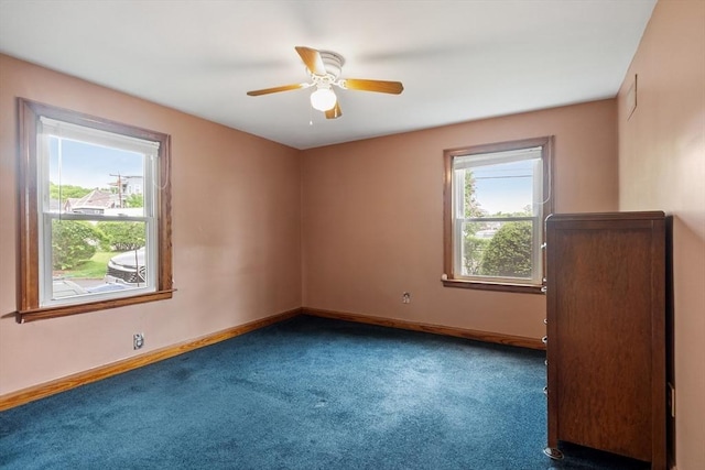 16 Elm St, Leominster, MA 01453 - carpeted empty room with baseboards and ceiling fan