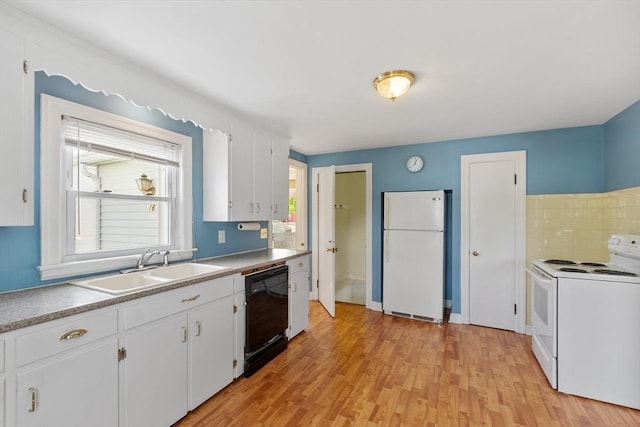 16 Elm St, Leominster, MA 01453 - kitchen featuring white appliances, a sink, white cabinets, light wood-style floors, and light countertops