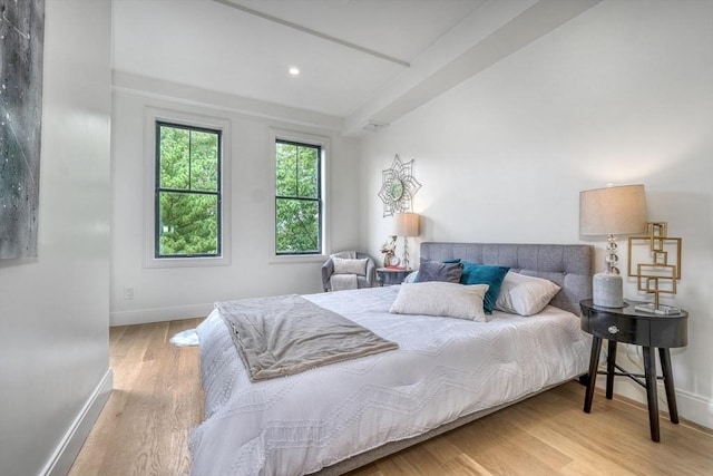 116 Moore St Unit 305, Boston, MA 02128 - bedroom with wood finished floors, baseboards, and beamed ceiling