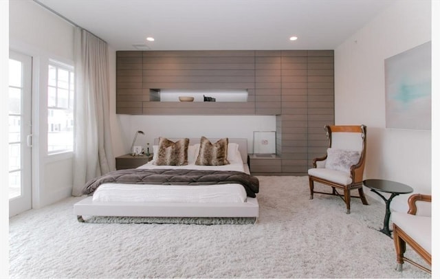 carpeted bedroom featuring recessed lighting