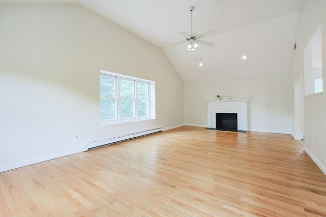37 Annetta Rd, Ashland, MA 01721 - unfurnished living room with baseboard heating, vaulted ceiling, light wood finished floors, ceiling fan, and a fireplace with flush hearth