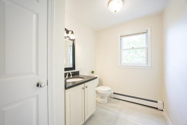 37 Annetta Rd, Ashland, MA 01721 - bathroom with baseboard heating, vanity, toilet, and tile patterned floors