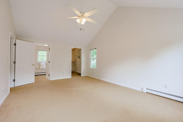 37 Annetta Rd, Ashland, MA 01721 - empty room with a ceiling fan, a baseboard heating unit, light colored carpet, baseboards, and high vaulted ceiling