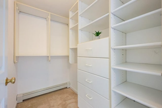 37 Annetta Rd, Ashland, MA 01721 - walk in closet with a baseboard heating unit and light carpet