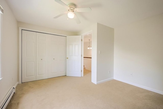 37 Annetta Rd, Ashland, MA 01721 - unfurnished bedroom featuring light carpet, a baseboard radiator, a closet, and baseboards