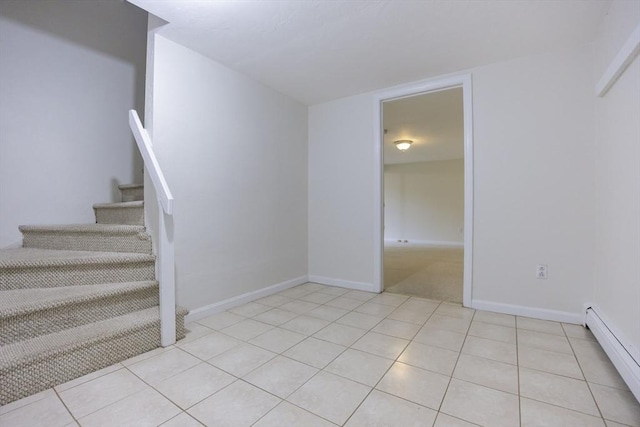 37 Annetta Rd, Ashland, MA 01721 - staircase with baseboard heating, tile patterned flooring, and baseboards