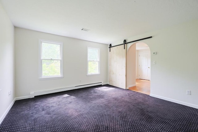 37 Annetta Rd, Ashland, MA 01721 - carpeted empty room with a baseboard radiator, arched walkways, baseboards, and a barn door