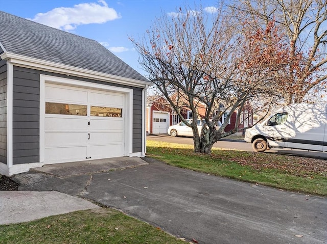 garage with driveway