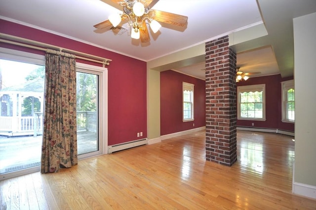 446 Elm St, East Bridgewater, MA 02333 - unfurnished room with a baseboard heating unit, decorative columns, ceiling fan, hardwood / wood-style floors, and healthy amount of natural light
