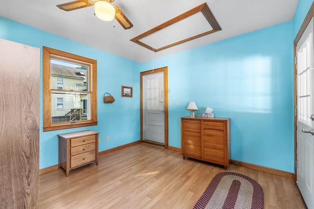 interior space with ceiling fan and light wood-type flooring