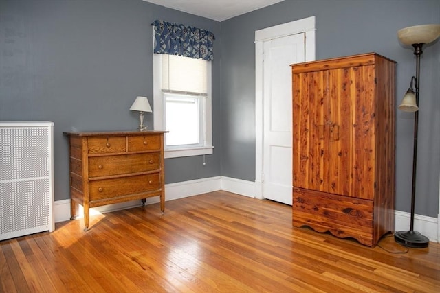 unfurnished bedroom featuring hardwood / wood-style floors