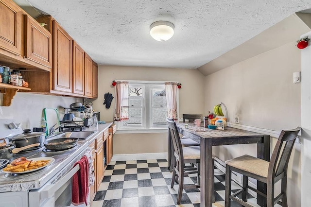 kitchen featuring a textured ceiling