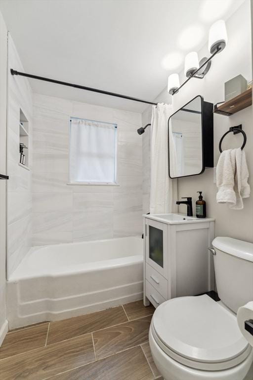 17 Atwood Ave, Millbury, MA 01527 - bathroom featuring shower / bath combo with shower curtain, toilet, vanity, and wood finished floors