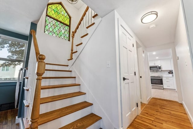 17 Atwood Ave, Millbury, MA 01527 - stairway with hardwood / wood-style floors and baseboards