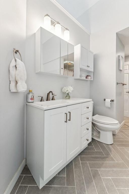 17 Atwood Ave, Millbury, MA 01527 - bathroom with vanity, toilet, and baseboards