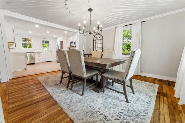17 Atwood Ave, Millbury, MA 01527 - dining space featuring ornamental molding, a chandelier, wood finished floors, baseboards, and recessed lighting