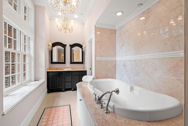 bathroom featuring a tub, tile walls, vanity, ornamental molding, and an inviting chandelier